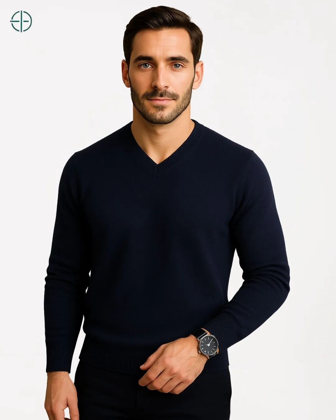 Homem maduro diante de parede rústica vestindo malha de caxemira de luxo