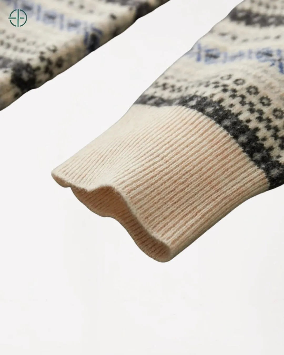 Foco na manga de corte reto, uma assinatura do estilo vintage em caxemira.