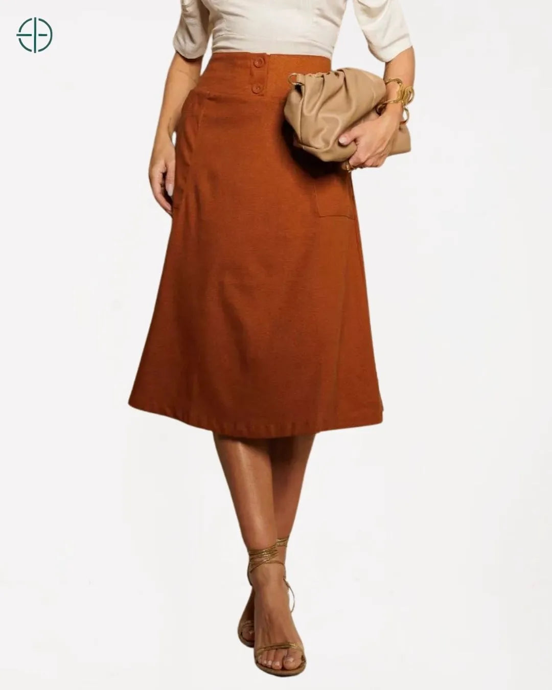 look completo com sandália rasteira e saia midi de linho