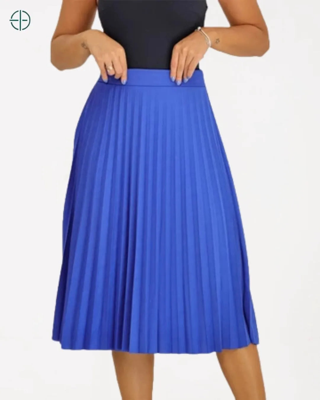 saia em composição com acessórios e calçado sofisticado