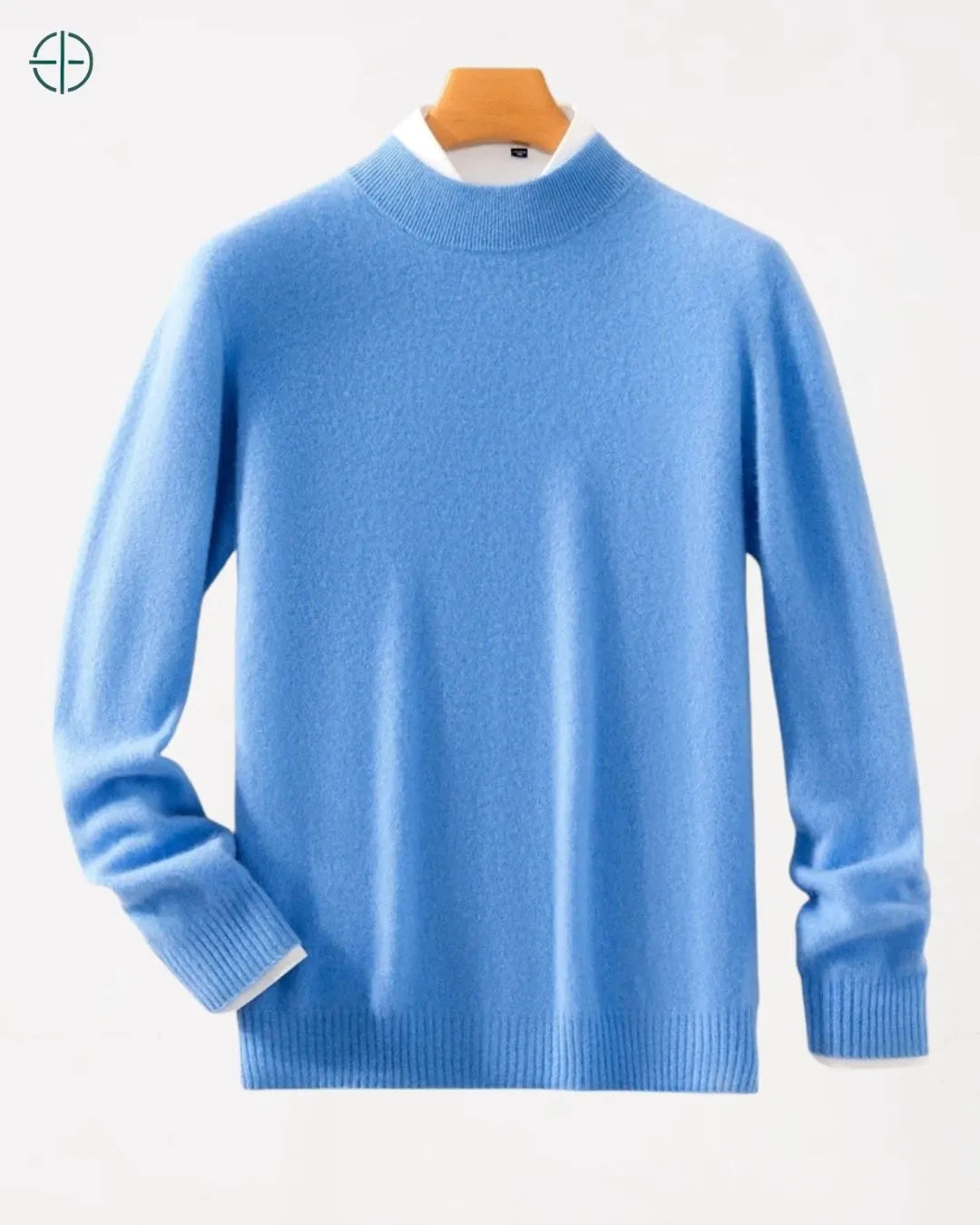 A uniformidade da textura por toda a extensão do suéter de caxemira.