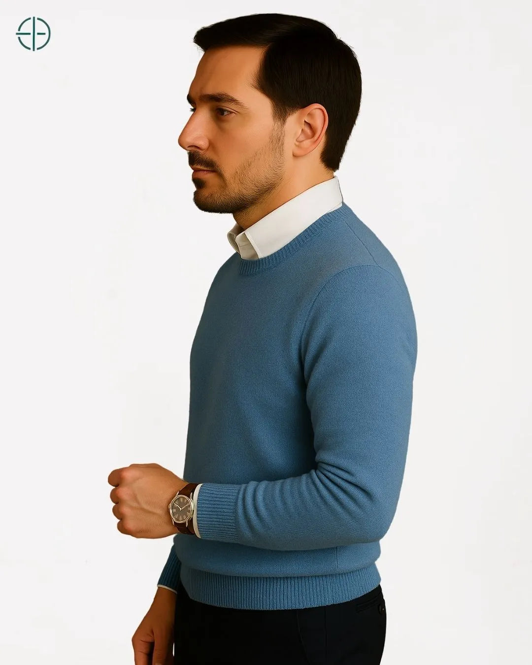 Suéter dobrado sobre superfície elegante revelando cuidado artesanal