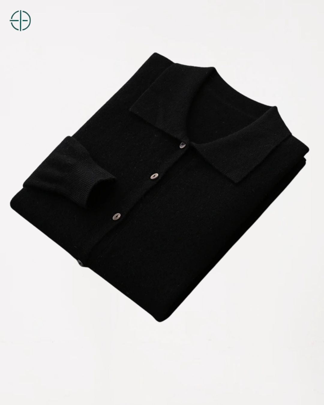 A junção delicada da manga ao corpo da blusa de caxemira.


