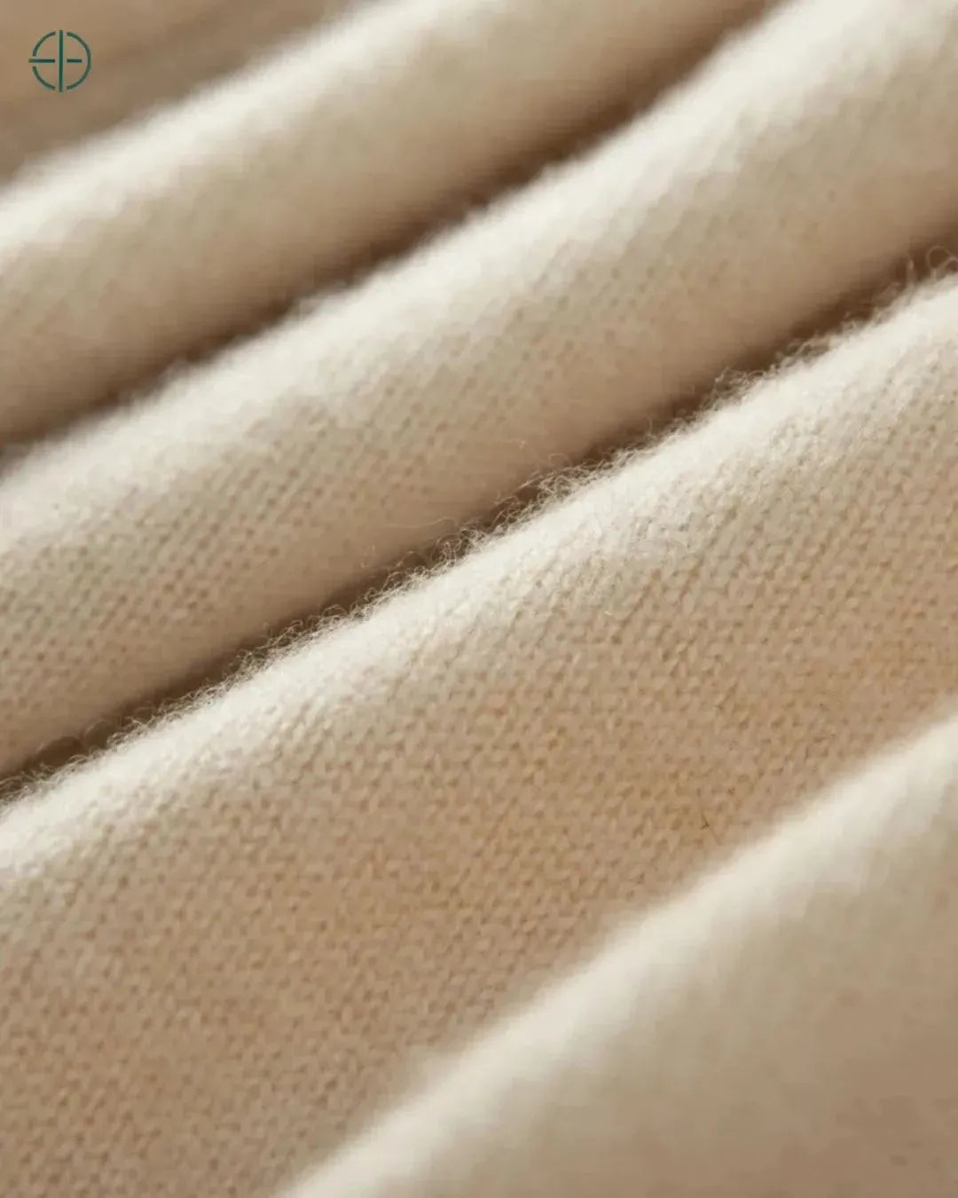 toque premium da caxemira evidenciado em detalhe de tecido

