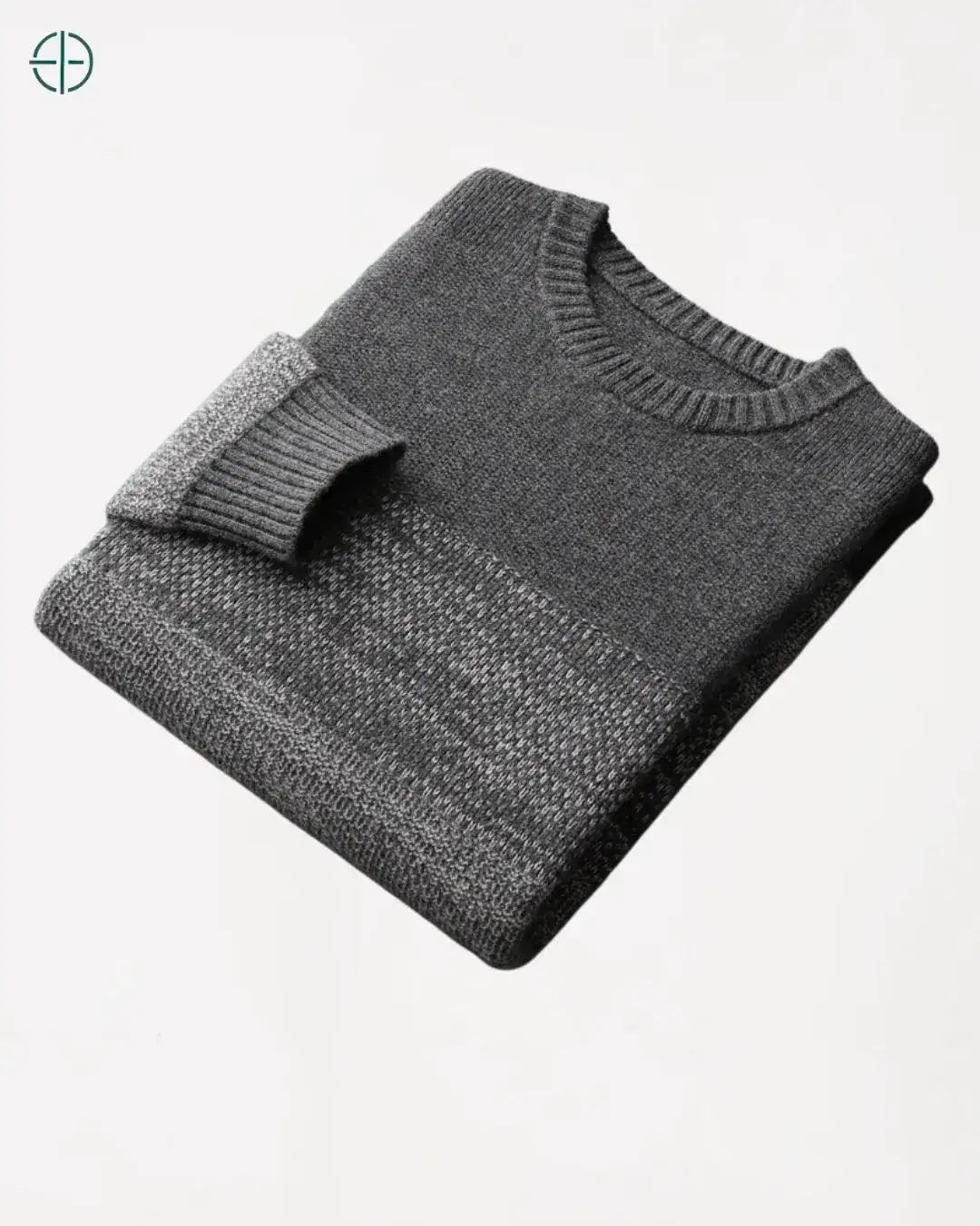 Close-up da padronagem, mostrando a trama Jacquard tecida com fios de pura caxemira.

